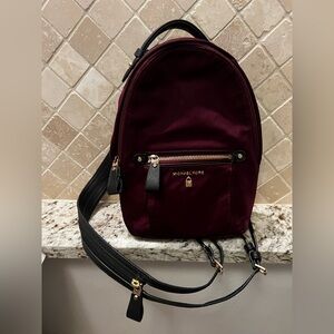 Michael Kors Maroon Medium sized Sling Backpack with Gold Accents